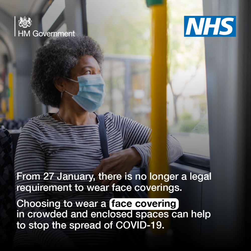 Govt and NHS image: lady on public transport wearing face mask