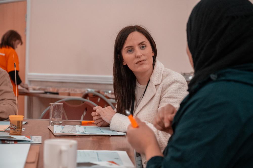 Sam from (TSAB) talking to carer at carers workshop