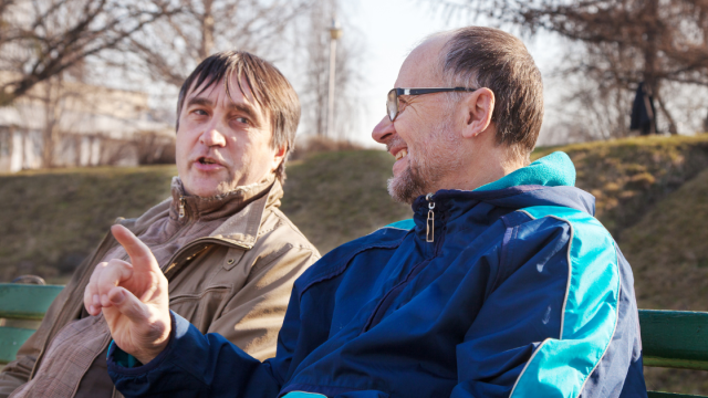 Two men chatting