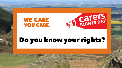 Photo taken from Roseberry topping looking towards Middlesbrough with white box in centre with orange border surrounding WCYC logo, Carers Rights Day logo and text: Do you know your rights?