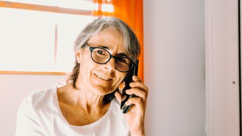 Lady smiling on phone