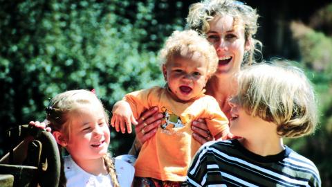 Photo of lady with three children