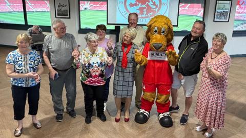 carers from dementia dance in a group