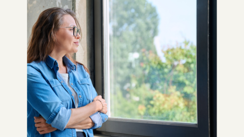 Kate a carer looking out the window
